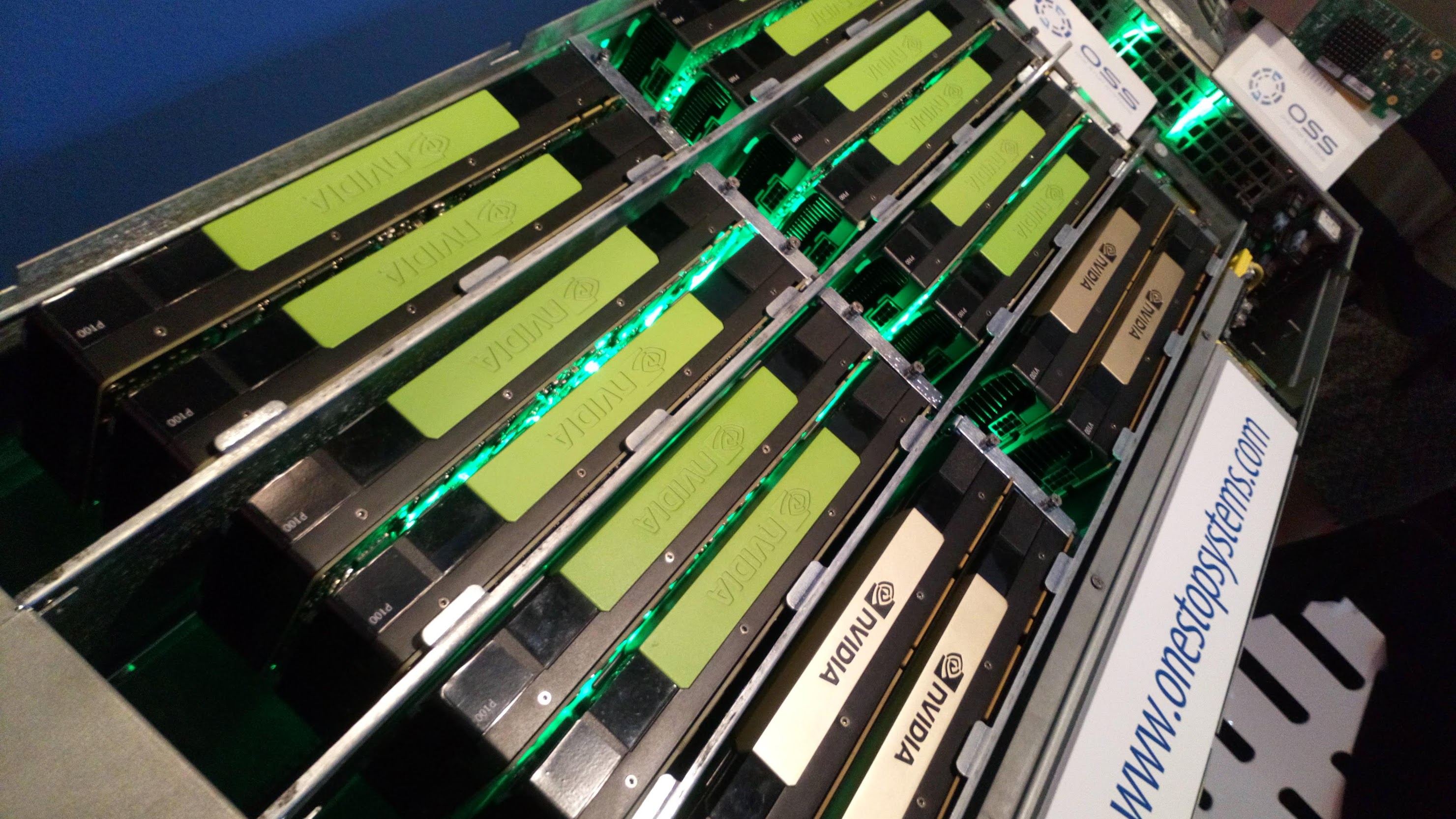 A server with a large number of Nvidia GPUs mounted in rows.